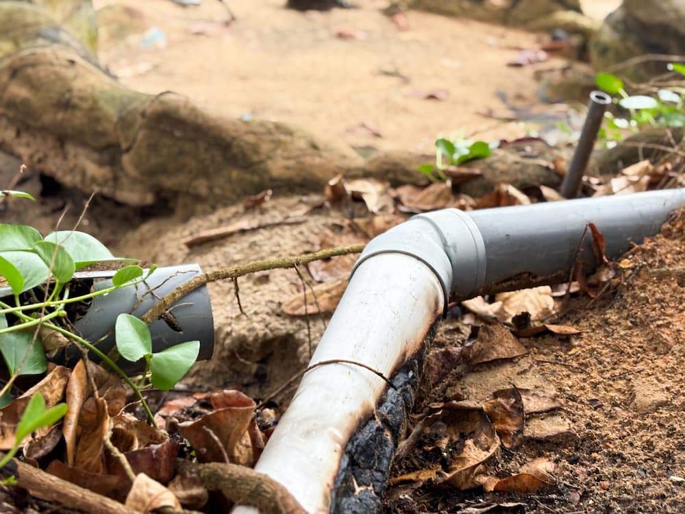 Featured image for post: Is Shifting Dallas Soil Breaking Your Pipes? 5 Signs You Have a Slab Leak